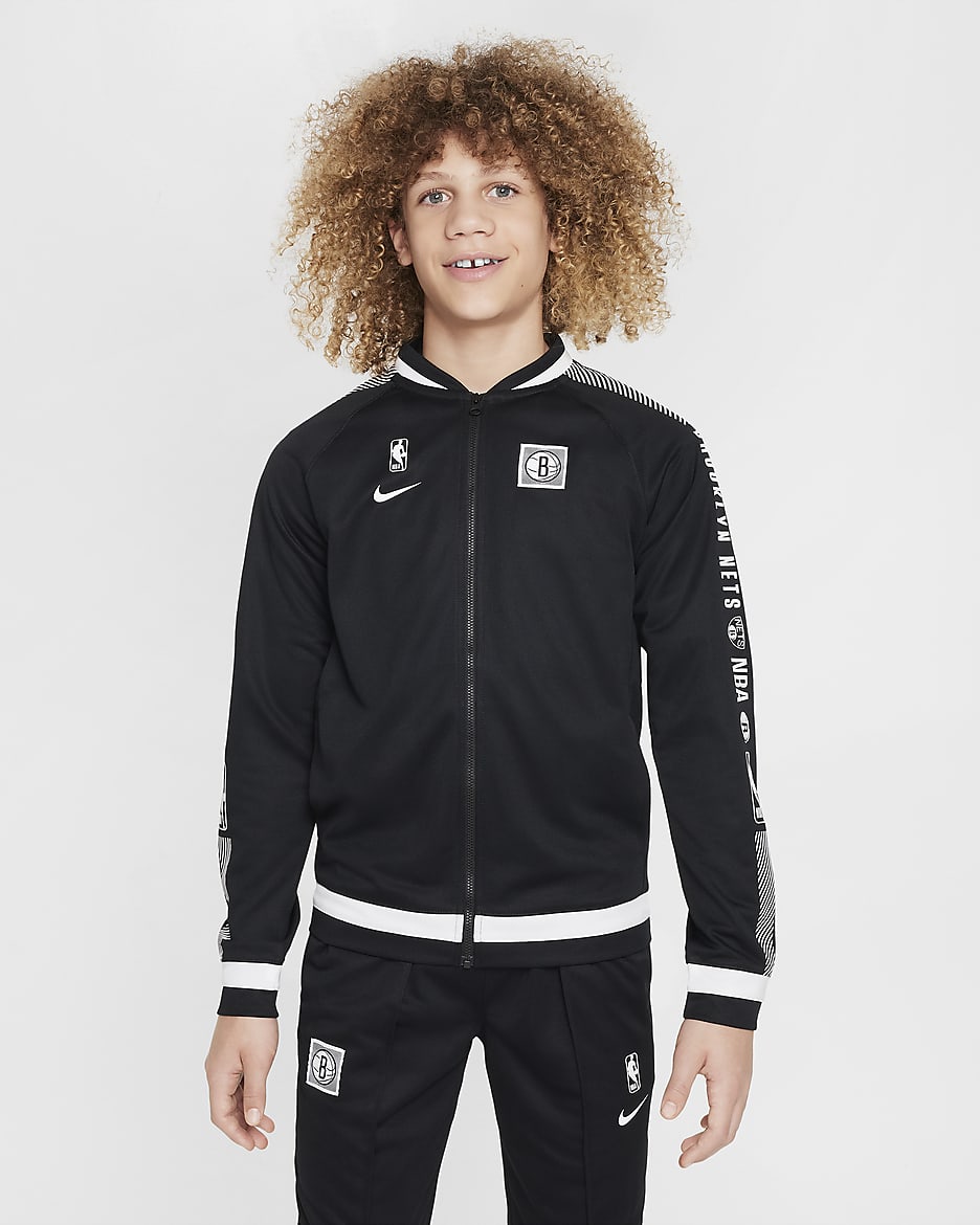 Brooklyn Nets Starting 5 Courtside Older Kids Nike Dri FIT NBA Tracksuit. Nike UK